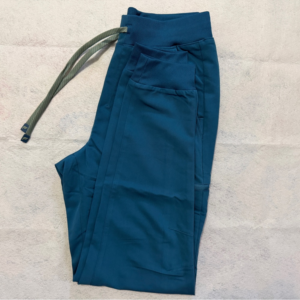 Fabletics scrub pants in color Caribbean Blue